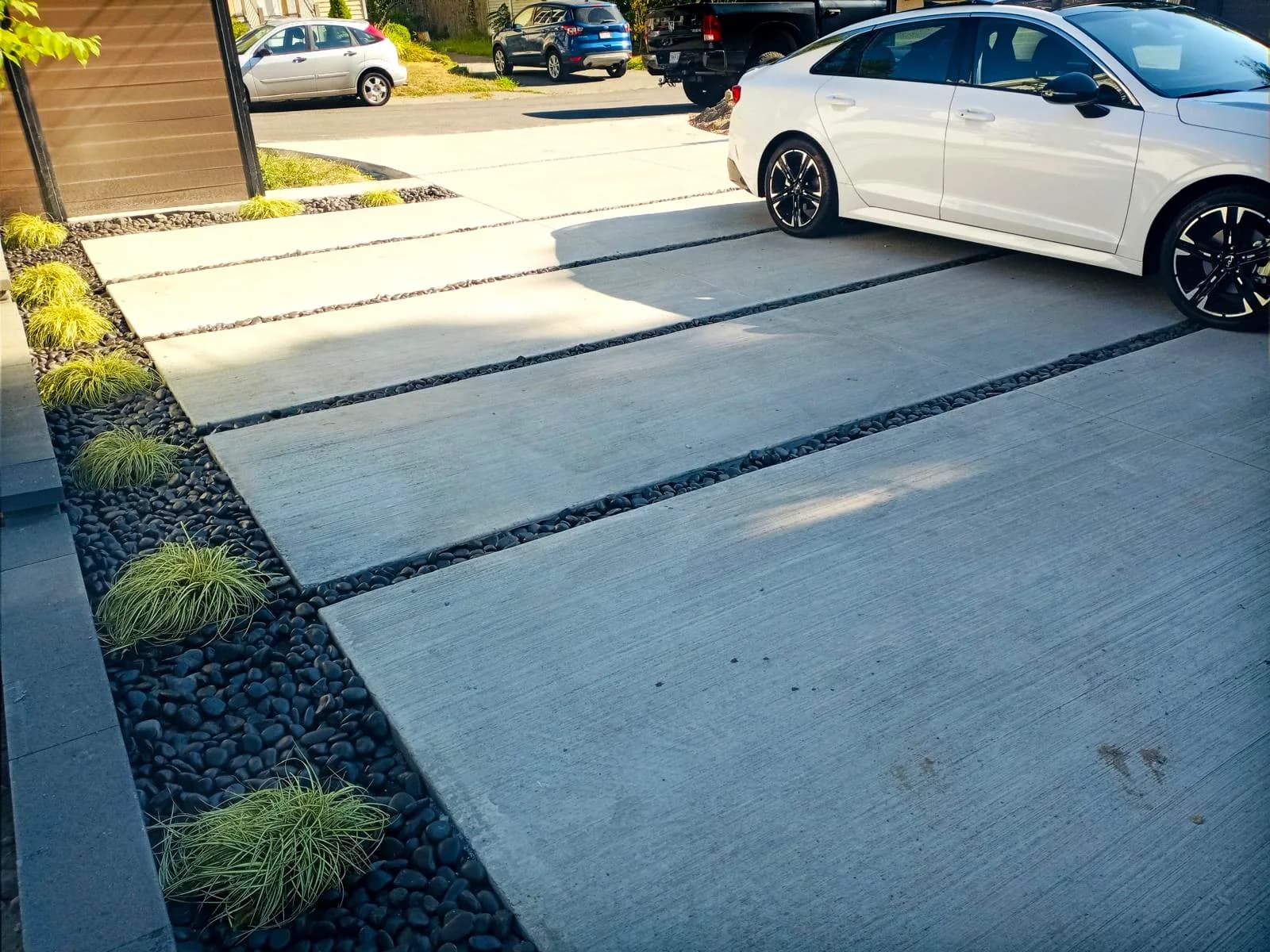 Modern driveway with river rock